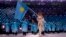 SOUTH KOREA -- Abzal Azhgaliev of Kazakhstan carries the national flag during the Olympic Opening ceremony reception in Pyeongchang, February 9, 2018