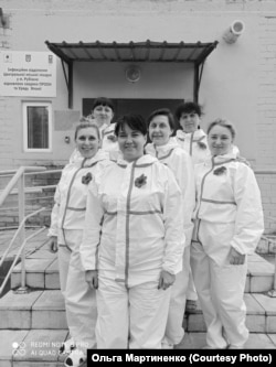 Ольга Мартиненко (по центру) з колегами