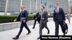Брюссель, 19 вересня 2019 року. Голова правління НАК «Нафтогаз» Андрій Коболєв (ліворуч) та тодішній міністр енергетики і охорони навколишнього середовища України Олексій Оржель (праворуч) після газових переговорів між Європейським союзом, Росією та Україною.