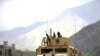 US Army humvee patrols Naray in Nuristan province
