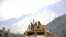 US Army humvee patrols Naray in Nuristan province