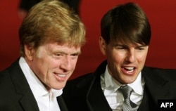 Regizorul Robert Redford și actorul Tom Cruise, înainte de proiecția filmului „Lei pentru miei” la a doua ediție a festivalului anual de film de la Roma - 23 octombrie 2007.