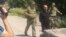 Перед началом встречи российские пограничники у блок-поста передали грузинской стороне заключенного Зазу Тавадзе