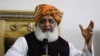 Maulana Fazlur Rehman gestures during a press conference in Islamabad on October 22.