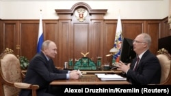 Президент РФ Володимир Путін та генеральний директор Російського фонду прямих інвестицій Кирило Дмитрієв.