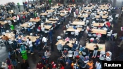 Refugiați primiți la München