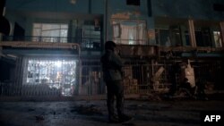 FILE: The site of suicide attack against a minibus carrying employees of Afghan TV channel TOLO which killed seven in Kabul in January 2016.