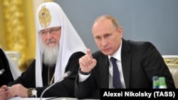Președintele Vladimir Putin și Patriarhul Kiril
