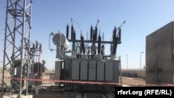 FILE: In July, Afghan president Ashraf Ghani and Turkmenistan officials during opened a power station in northern Badghis province which borders Turkmenistan.