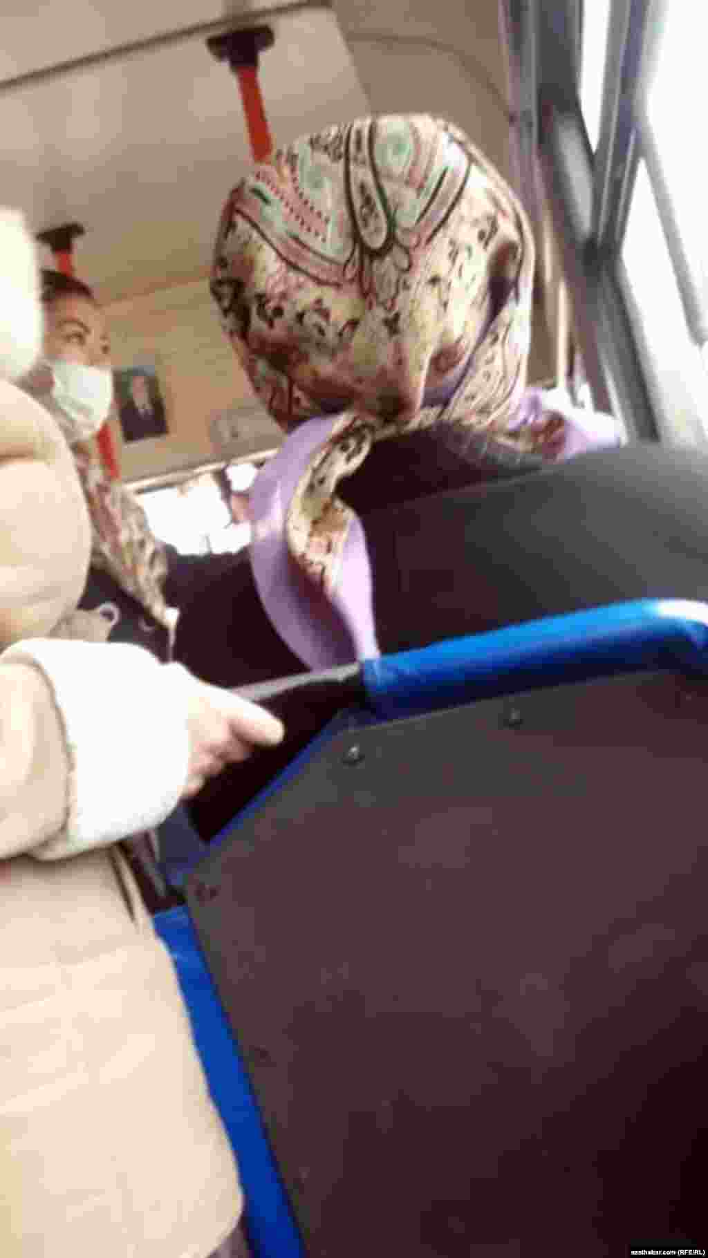 Passengers on board a bus in Ashgabat, Turkmenistan