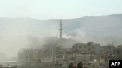 Дым над пригородом Дамаска Гхутой, как говорят повстанцы - химический газ
