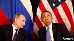 Barack Obama(djathtas) dhe Vladimir Putin 