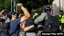 Гонконгдо улуттук коопсуздук тууралуу мыйзам күчүнө кирген күнү калайман нааразылык акциялары өттү. 