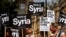 Демонстрация против войны в Сирии перед зданием парламента Великобритании