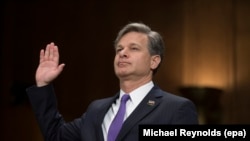 Крістофер Рей клянеться говорити лише правду на слуханні про його кандидатуру, Вашингтон, 12 липня 2017 року