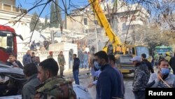 Pamje nga vendi ku ka ndodhur shpërthimi në Damask.