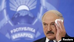Belarusian President Alyaksandr Lukashenka attends a news conference in Minsk on October 11. 