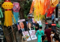 Portreti Bajdena i Haris, Mumbaj, India, 8.novembar 2020.