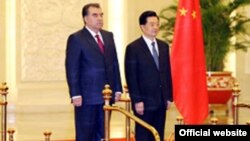 China -- Emomali Rahmon, the president of Tajikistan (L) with Hu Jintao, the president of China (R), undated 