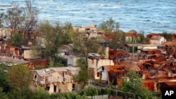 نمایی از ویرانه‌های ماریوپل که سه ماه زیر آتشبار سنگین ارتش روسیه بود