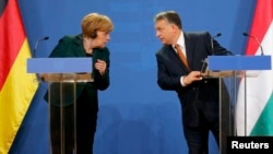 Angela Merkel şi Viktor Orban, la Budapesta, 2 februarie 2015