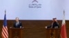 Secretarul de stat al SUA, Antony Blinken (s), și prim-ministrul și ministrul de externe al Qatar, șeicul Mohammed bin Abdulrahman Al Thani (d).