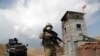 Турски војник чува стража на воена станица во Калдиран на турско-иранската граница во провинцијата Ван, Турција, 21 август 2021 година.