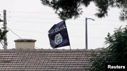 پرچم گروه حکومت اسلامی در سوریه