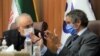 Iranian nuclear chief Ali Akbar Salehi (left) and IAEA head Rafael Grossi speak at a joint press conference in Tehran on August 25.