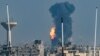 Fotografi e shkrepur nga jugu i Izraelit afër kufirit me Rripin e Gazës që shfaq tymin duke dalë nga ndërtesat e goditura nga sulmet izraelite. 1 dhjetor 2023.