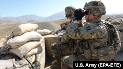 U.S. soldiers scan terrain and provide security during an operation in Kapisa Province in Afghanistan. (file photo)