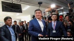 Presidential candidate Sooronbai Jeenbekov casts his ballot at a polling station during the presidential election in Bishkek on October 15. REUTERS/Vladimir Pirogov