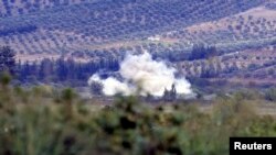 Туреччина - Дим від вибуху сирійського снаряду, південна частина провінції Хатай, 8 жовтня 2012 року