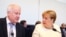 Angela Merkel și ministrul de interner Horst Seehofer la reîntîlnirea lor de marți la Berlin