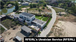 A drone shot captures the house built by Anatoliy Komar's father-in-law, Serhiy Hladkov.