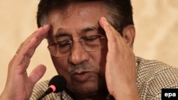 Pakistan -- Pervez Musharraf gestures during a press conference in Karachi, March 27, 2013