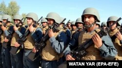 FILE: An Afghan police graduation ceremony in Helmand, November 2018.