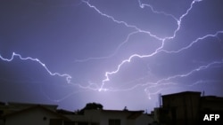 Pakistan - Lightning breaks during a thunderstorm in the Pakistani capital Islamabad on June 1, 2016. 