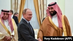 Președintele Vladimir Putin și Prințul Mohammed bin Salman la o întîlnire la Kremlin în 14 iunie 2018