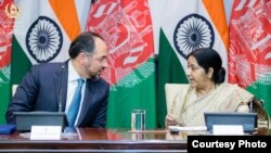 Afghan Foreign Minister Salahuddin Rabbani (L) with his Indian counterpart Sushma Swaraj in New Delhi.