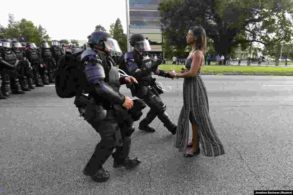 Ieshia Evans became a symbol of the Black Lives Matter movement in the United States after her arrest during a protest in Baton Rouge. Reuters photographer Jonathan Bachman, who captured the moment, told a colleague that &quot;I turned and looked over my right shoulder and saw this woman standing in the road. I knew right away what was about to happen. &quot;I quickly moved and took the shot. When I came back to my car and looked through my take I knew I had a strong image,&quot; he was quoted as saying by the news agency. &quot;However, I didn&#39;t anticipate that the image would go viral. I am grateful that it has stimulated a discussion about an important issue in this country.&quot;