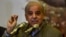 Shahbaz Sharif, opposition leader and brother of former Pakistani Prime Minister Nawaz Sharif, speaks during a press conference regarding his ill brother, in Lahore, on November 14.
