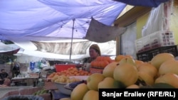 Овощной рынок в городе Оше.