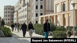 Students walk on the campus of Khatam-al Nabyeen University in Kabul, which the Taliban has announced it is shutting down. (file photo)