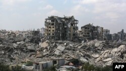 Veči deo grada Gaza kao i ostatak Pojasa Gaze pretvoren je u ruševine. Na slici zgrade uništene u izraelskim napadima u gradu gaza, 8. avgust 2025.