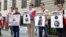 Protesters near the Belarusian Embassy in Washington marked the 15th anniversary of the disappearance of two critics of the regime of Belarusian President Alyaksandr Lukashenka.