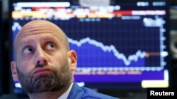 Один із трейдерів на Нью-Йоркській фондовій біржі