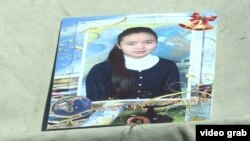 Фотография убитой Бурулай Турдаалы кызы.