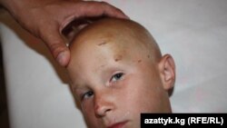 5-летний Коля Рожин из села Беловодское Чуйской области, 27 июня 2012 года.