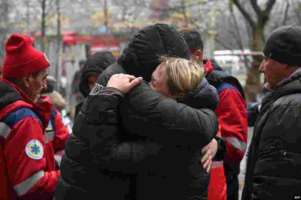 Residents, meanwhile, comforted each other.